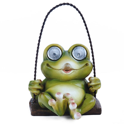 Solar Garden Swing Frog Statue – Resin Outdoor LED Light Up Patio & Yard Decor Ornament